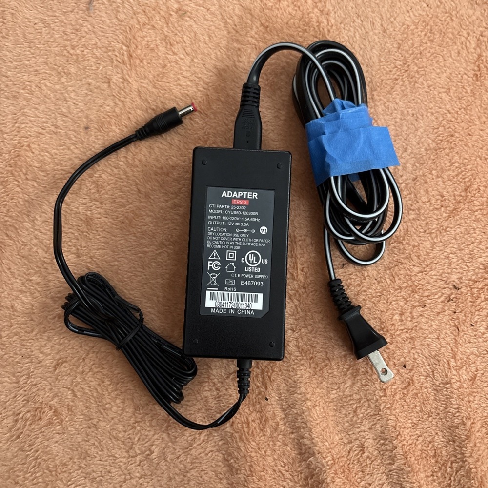 Adapter :model no: CTI#25-2302. input :120v AC. Out put 12V  DC 3.0A